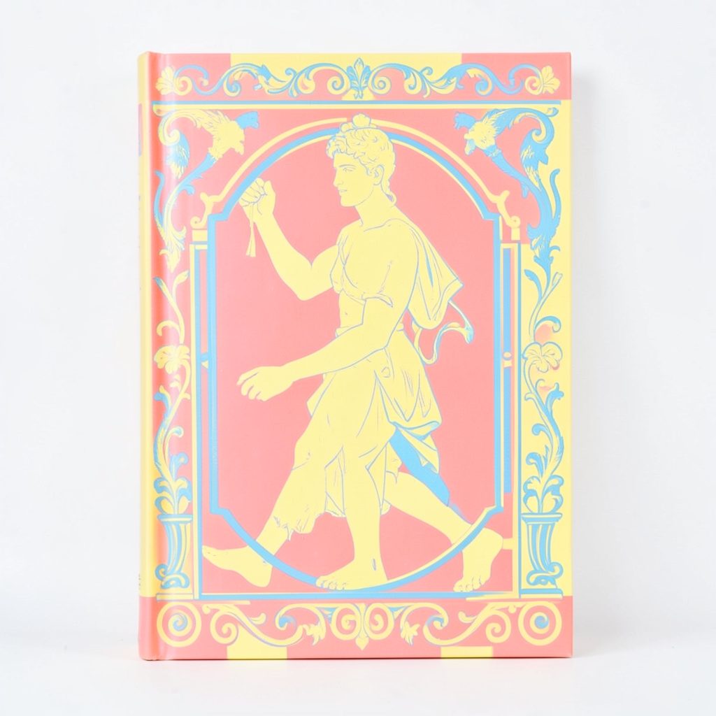 A vivid book cover with Greco-Roman motifs rendered in bold pastels — coral pink, lemon yellow, and Aegean blue